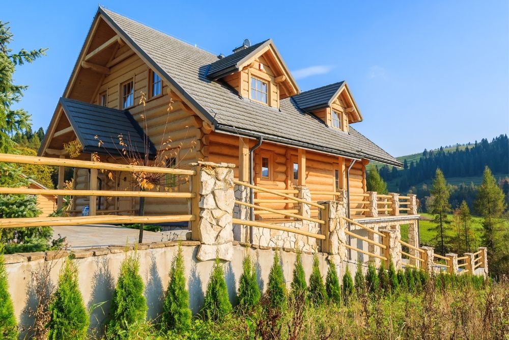 Log home on a wooded hillside